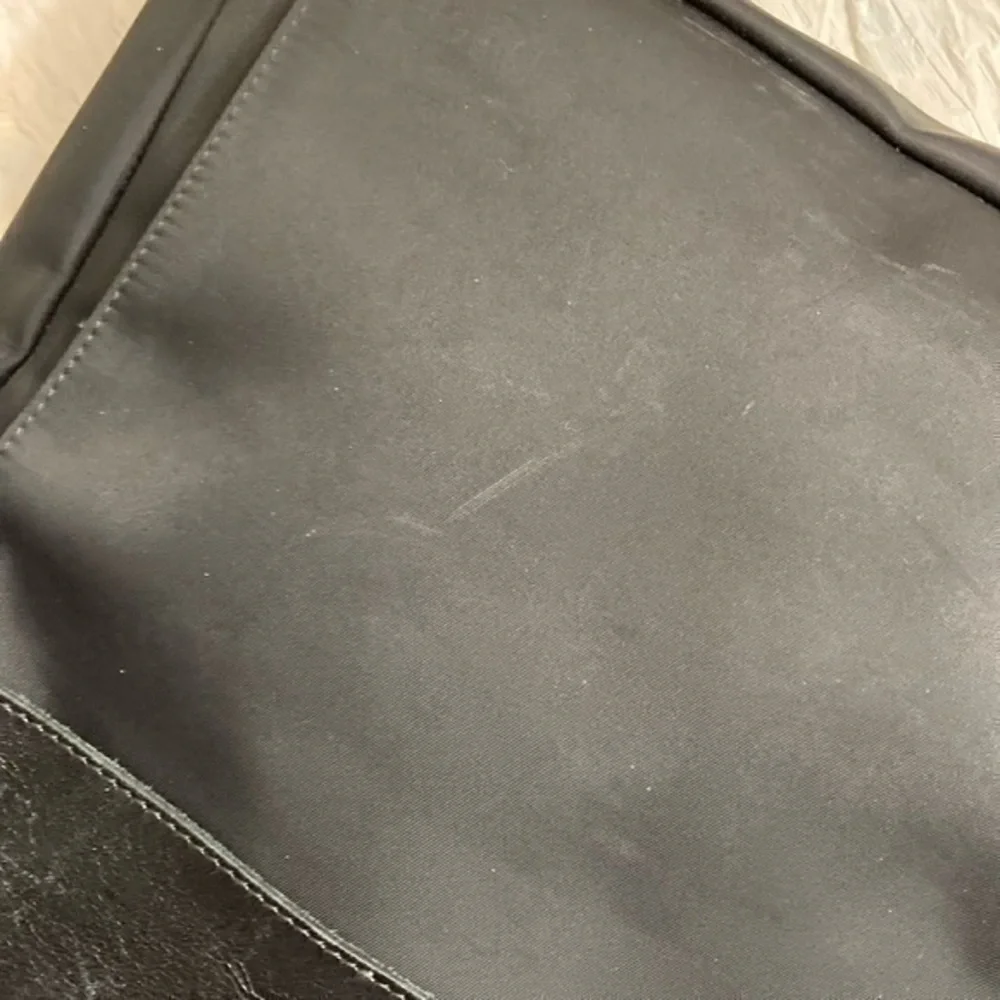 Longchamp unisex black nylon and leather side pack messenger bag